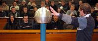 Photographs from a lecture demonstration by Alastair Bruce using a Van der Graaf generator.